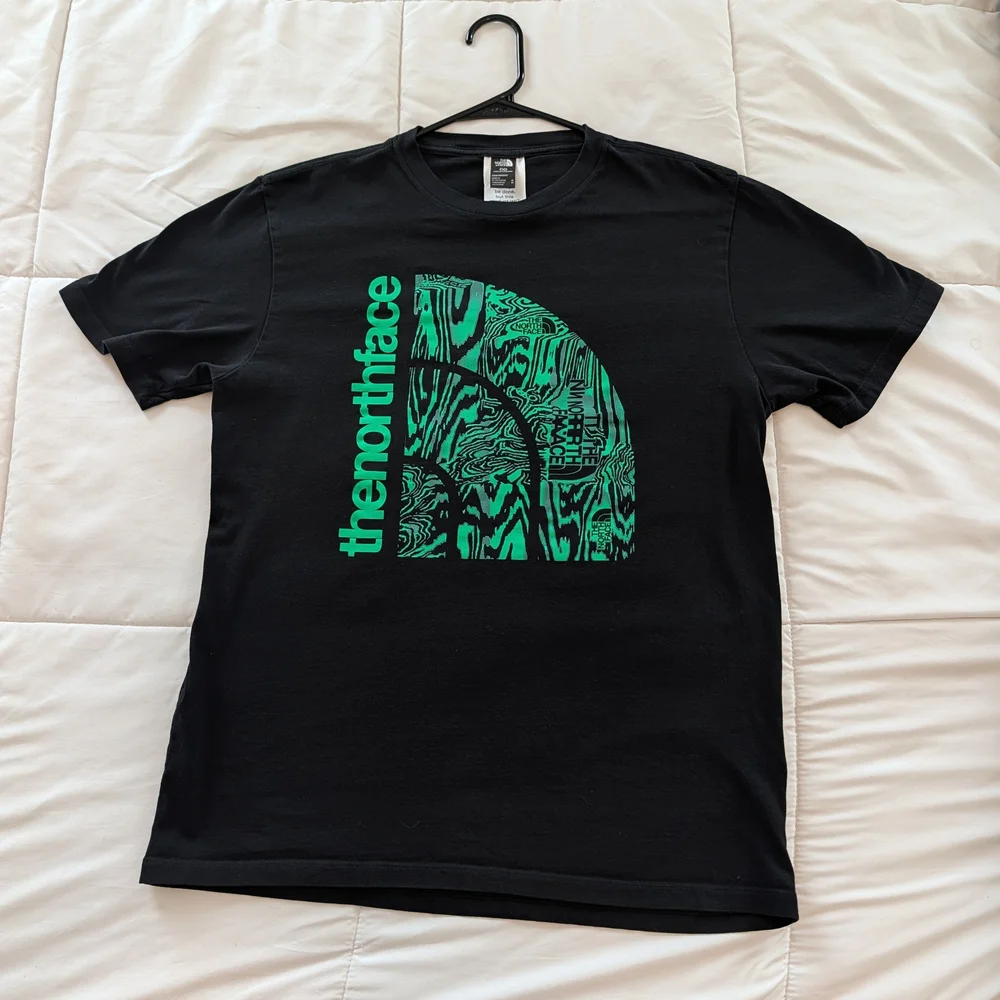 The North Face Black T-Shirt with Green Graphic